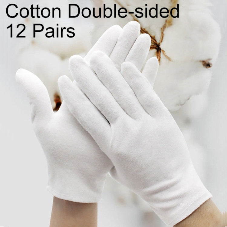 White cotton double-sided work gloves, shown as a pair held up by hands