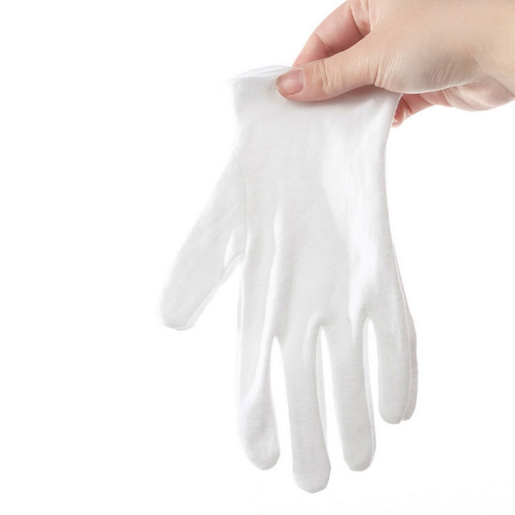 White cotton work glove with open palm and fingers, held up for view