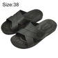 Black X-strap slide slippers with textured non-slip sole, size 38