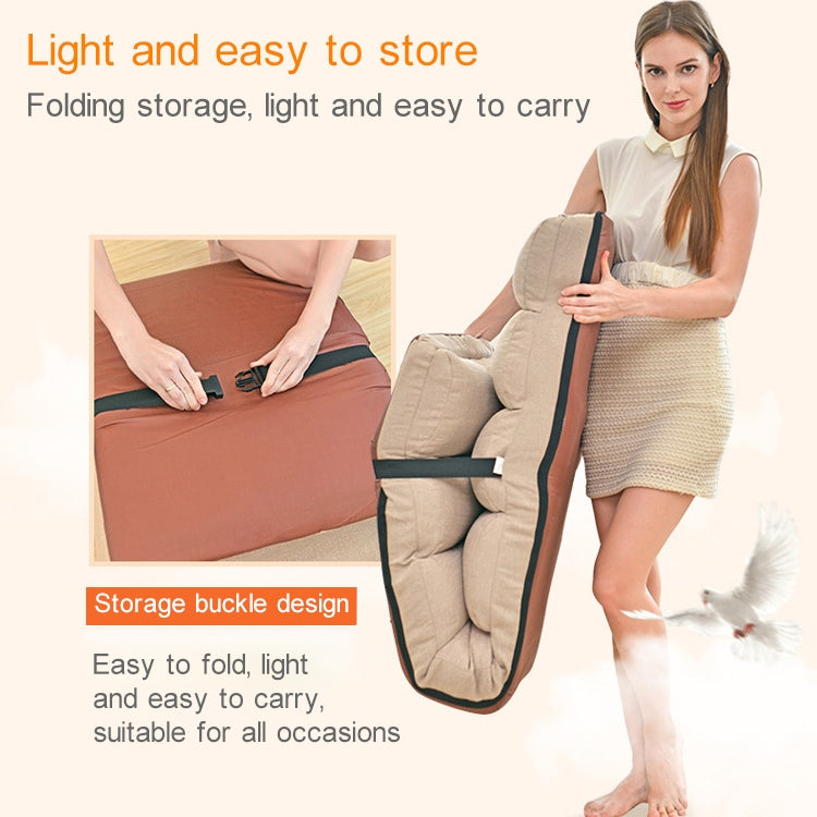 Foldable blue floor recliner stored and strapped for easy carrying