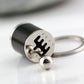 Black gear shift keychain key ring with circular plate and hanging metal ball
