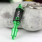 Green shock absorber keychain key ring holder with black spring coil