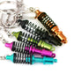 Multi-color shock absorber keychains with key rings and black spring coils