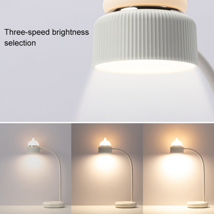 Close-up cat LED desk lamp with ribbed shade and three-level brightness glow