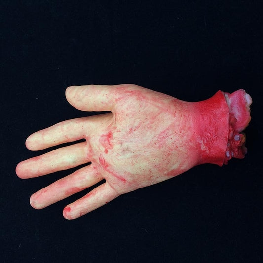 Beige side-view bloody five-finger hand prop with red smears at the wrist
