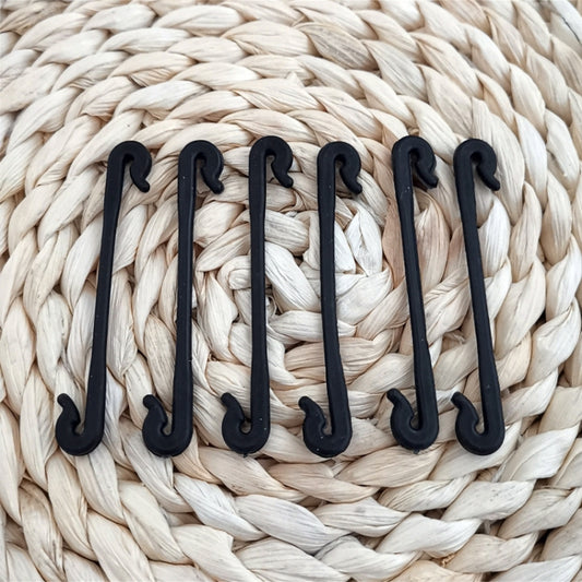 Set of black gardening vine tie straps with hooked tips