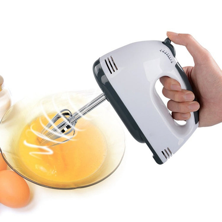 White and dark gray handheld electric egg beater with two stainless whisk beaters.