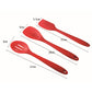 Red silicone kitchen utensil set with three spatula tools and size labels