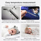 White non-contact infrared thermometer held near baby, temperature display visible