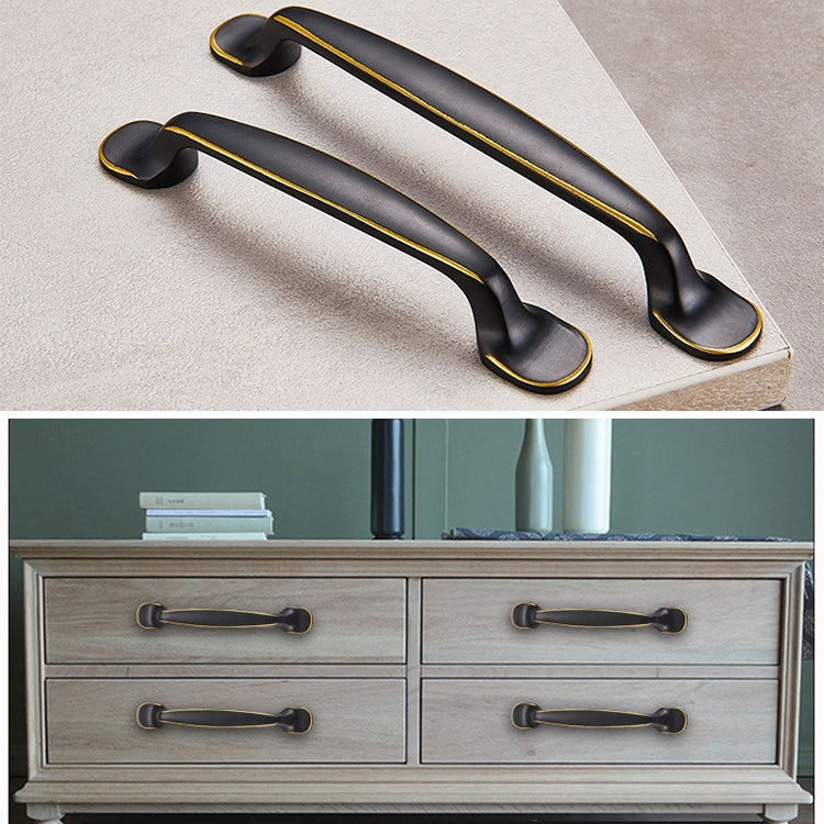 Set of two black drawer cabinet handles with gold-trimmed curved pulls