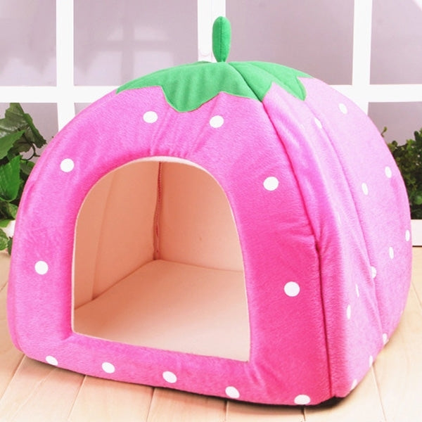 Pink strawberry pet tent with green leaf top and square front opening, white polka dots