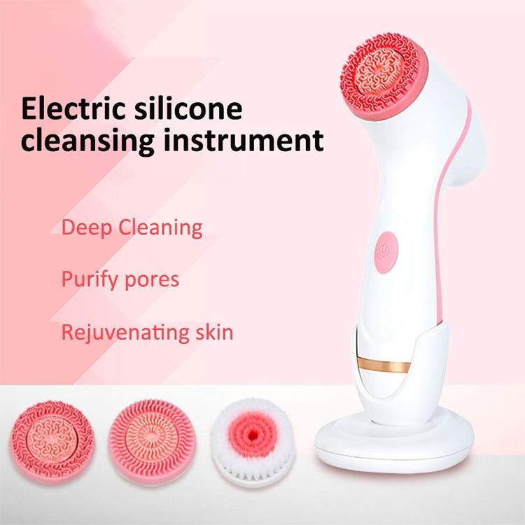 Pink electric silicone facial cleansing instrument with round vibration heads and base