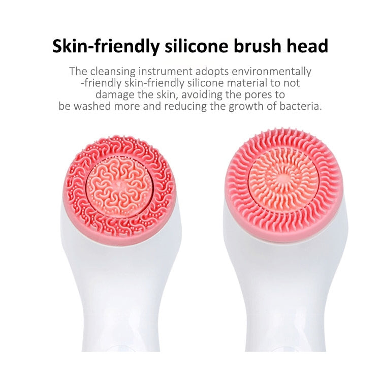 Two red silicone brush heads with swirl texture for facial cleansing