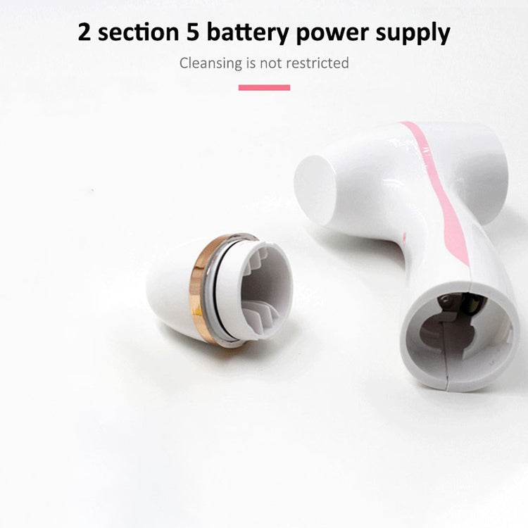 Battery-powered handheld facial cleanser with removable brush head