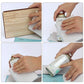 Hands using 240-grit wet and dry sanding sheets on wood surface