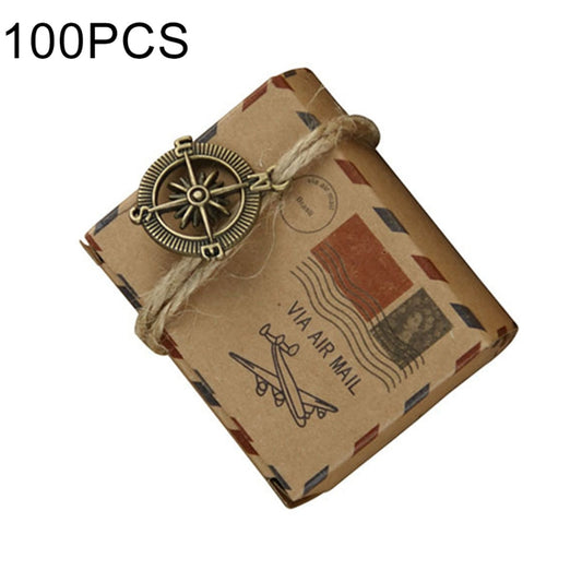 Compass-shaped kraft sugar box with retro mail pattern and twine bow, closed