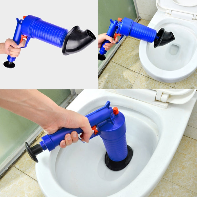 Blue pneumatic drain blaster clearing a toilet drain with black suction cup