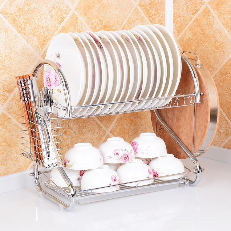 Chrome dish drying rack with stacked plates and cups, angled front