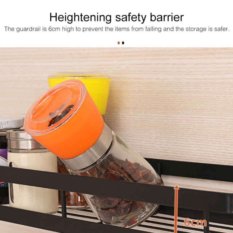 Wall-mounted rack with raised safety barrier holding a glass spice jar and more containers