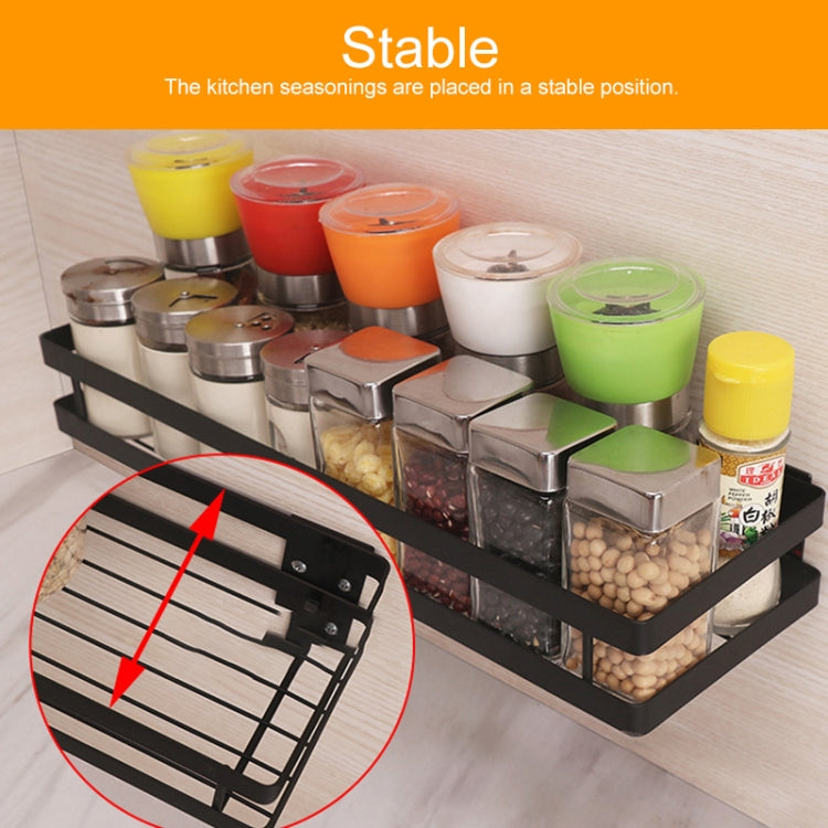 Black wall-mount seasoning rack filled with spice containers and jars