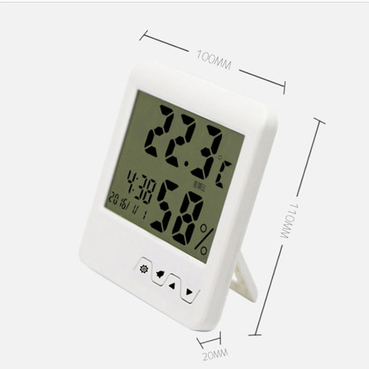 White indoor thermometer hygrometer with green LCD display, front buttons, and tilting stand