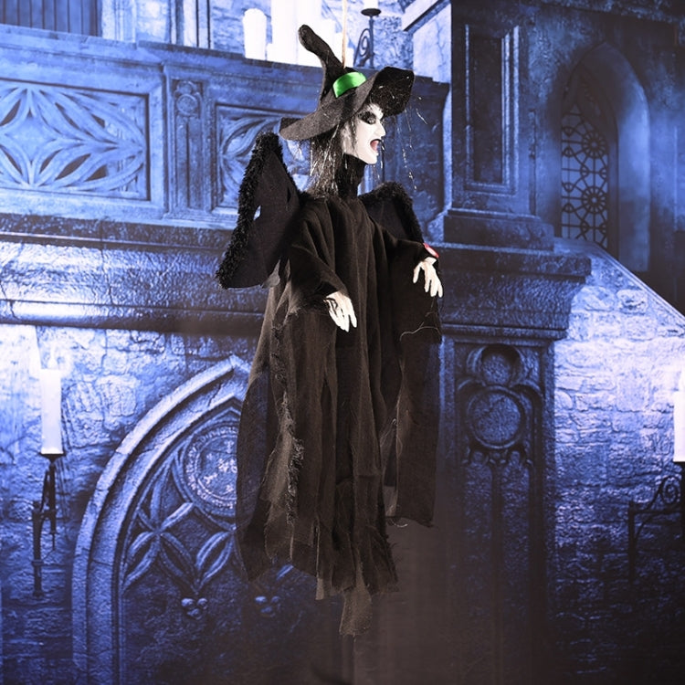 Hanging ghost decoration in black, profile view with wide hat and flowing robe