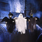 Set of hanging ghost decorations in black and white, each with hat and creepy face