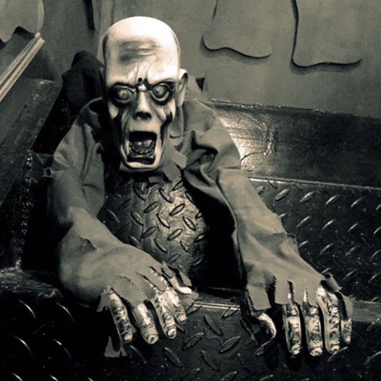 Crawling zombie ghost costume with bald skull mask, open mouth, and claw hands