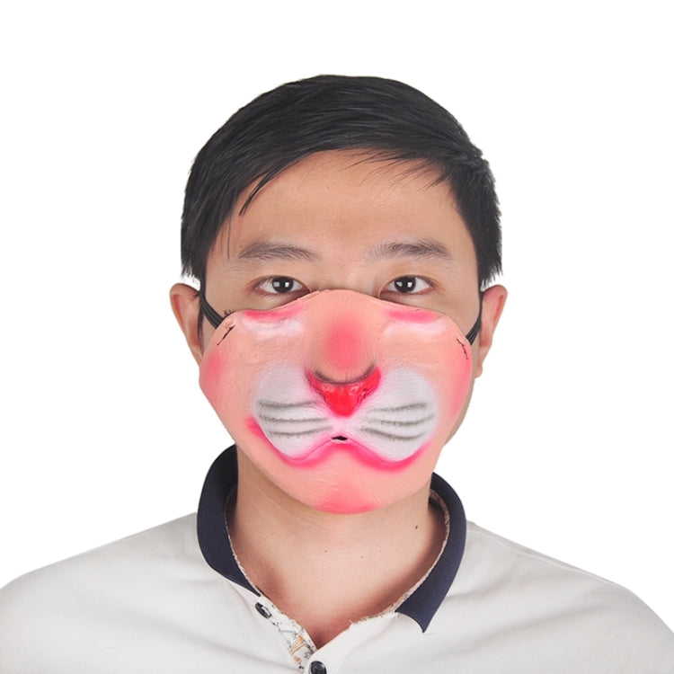 Person wearing pink clown latex half-face mask with white eye patches and red nose