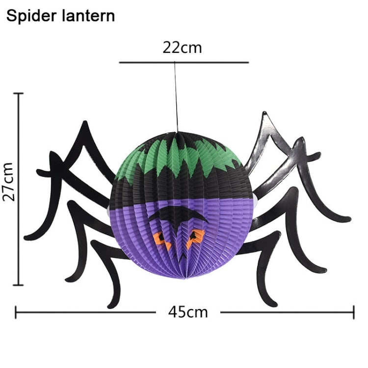 Spider paper lantern with green web top and purple body, black legs, orange face