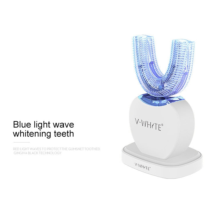 White electric silicone toothbrush on stand with blue-light whitening bristle head