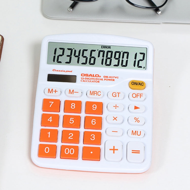 Desktop calculator with LCD display showing digits and colorful orange keypad buttons