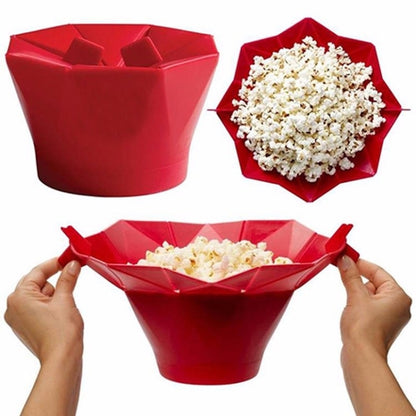 Red foldable silicone microwave popcorn maker with white popcorn pieces inside