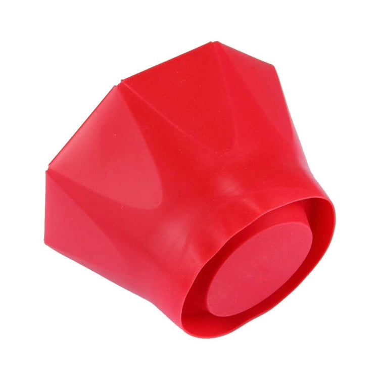 Red foldable silicone popcorn maker with bowl opening and folded side panels