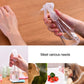 Clear plastic trigger spray bottle with mist nozzle in hand