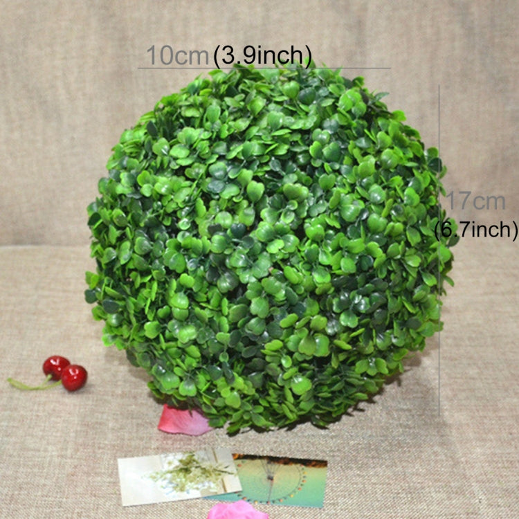 Artificial green plant ball topiary, spherical top with small pink pot and tag