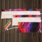 48-slot canvas pencil wrap pouch, folded roll-up with sunset tree print and drawstring ties
