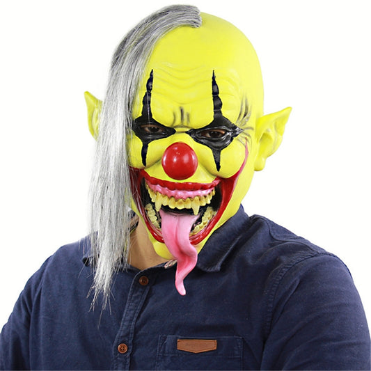Clown latex face mask with gray hair, yellow-green face, black eyes, red nose, open mouth