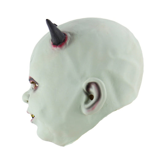 Devil vampire latex mask side view, pale green with black horns and yellow teeth