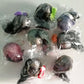 Assorted packaged hanging skull ornaments with black and colored tulle veils