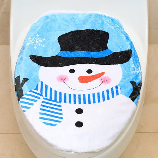 Snowman toilet lid cover with black top hat, blue scarf, and snowflake accents