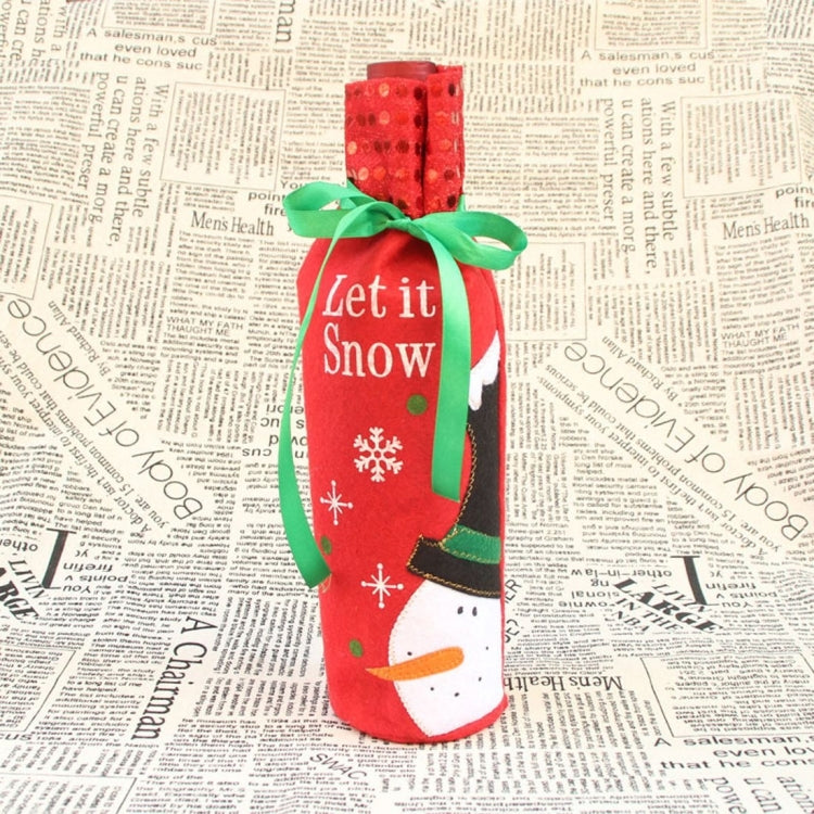 Red snowman wine bottle bag with 'Let it Snow' text and green ribbon handles