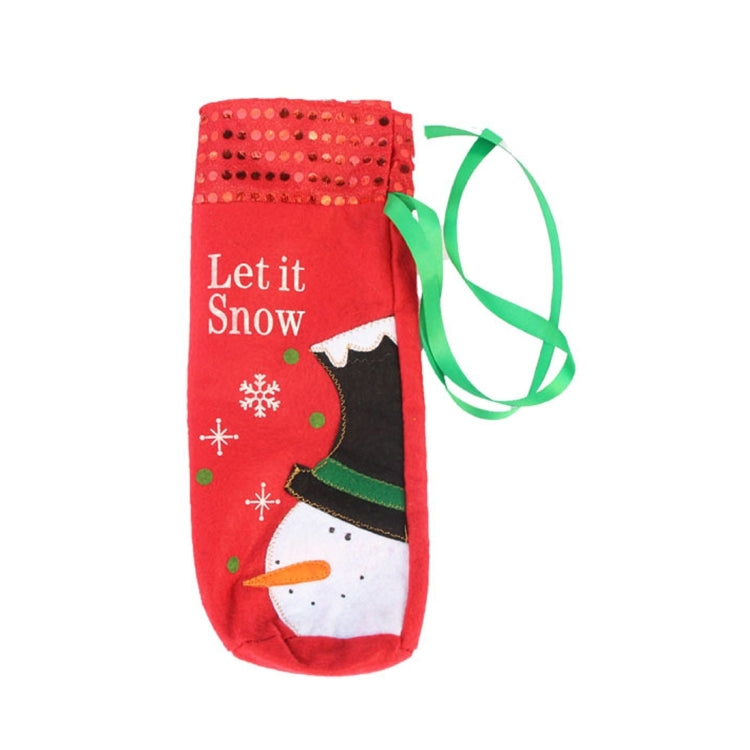 Red snowman wine bottle bag with green ribbon handle tie and snowflake trim