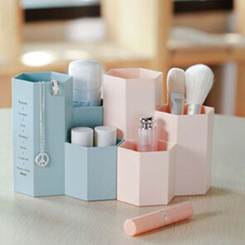 Pink hexagon stationery organizer with makeup brushes and bottles