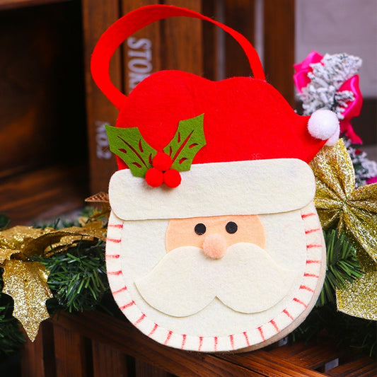 Non-woven Christmas gift bag with red Santa face, white beard, and red carry handle