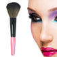 Blush brush with pink handle and rounded bristle head