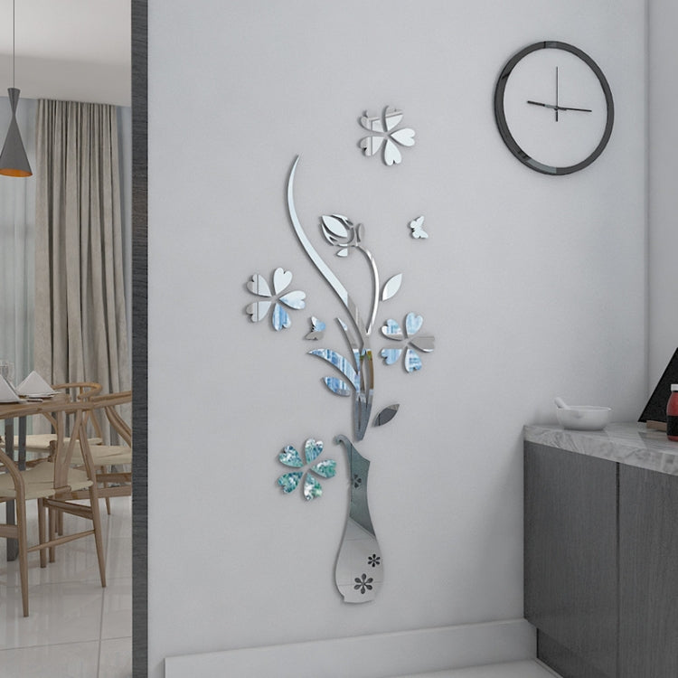 Silver 3D vase-style mirror wall sticker with flower and butterfly motifs on wall