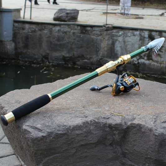 Green telescopic fishing pole with black grip and gold spinning reel