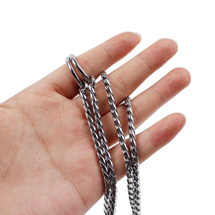 Metal snake-chain pet collar links with round rings, shown held in an open hand