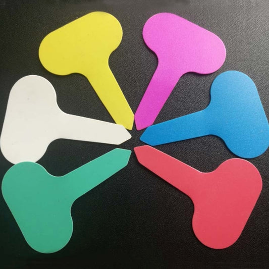 Assorted colorful heart-shaped plant label cards with peg-style tips